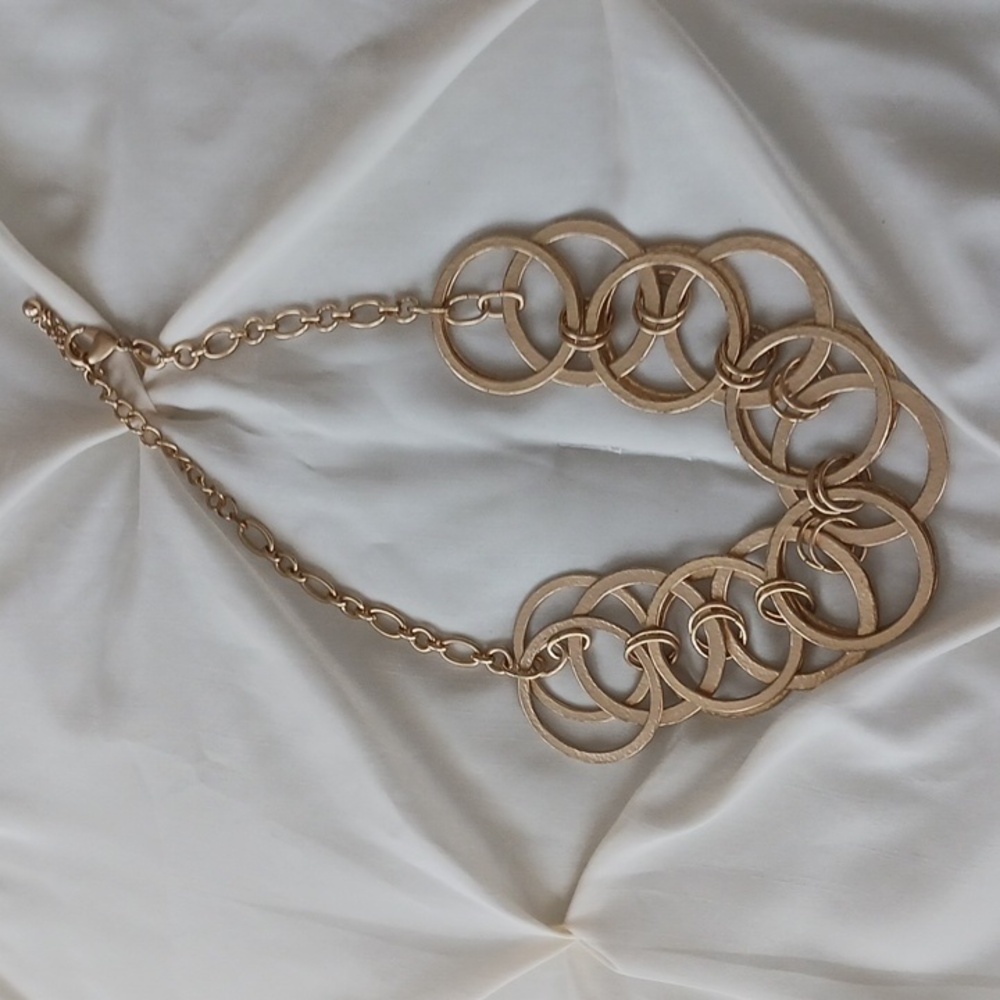 Chico’s gold tone overlapping rings necklace